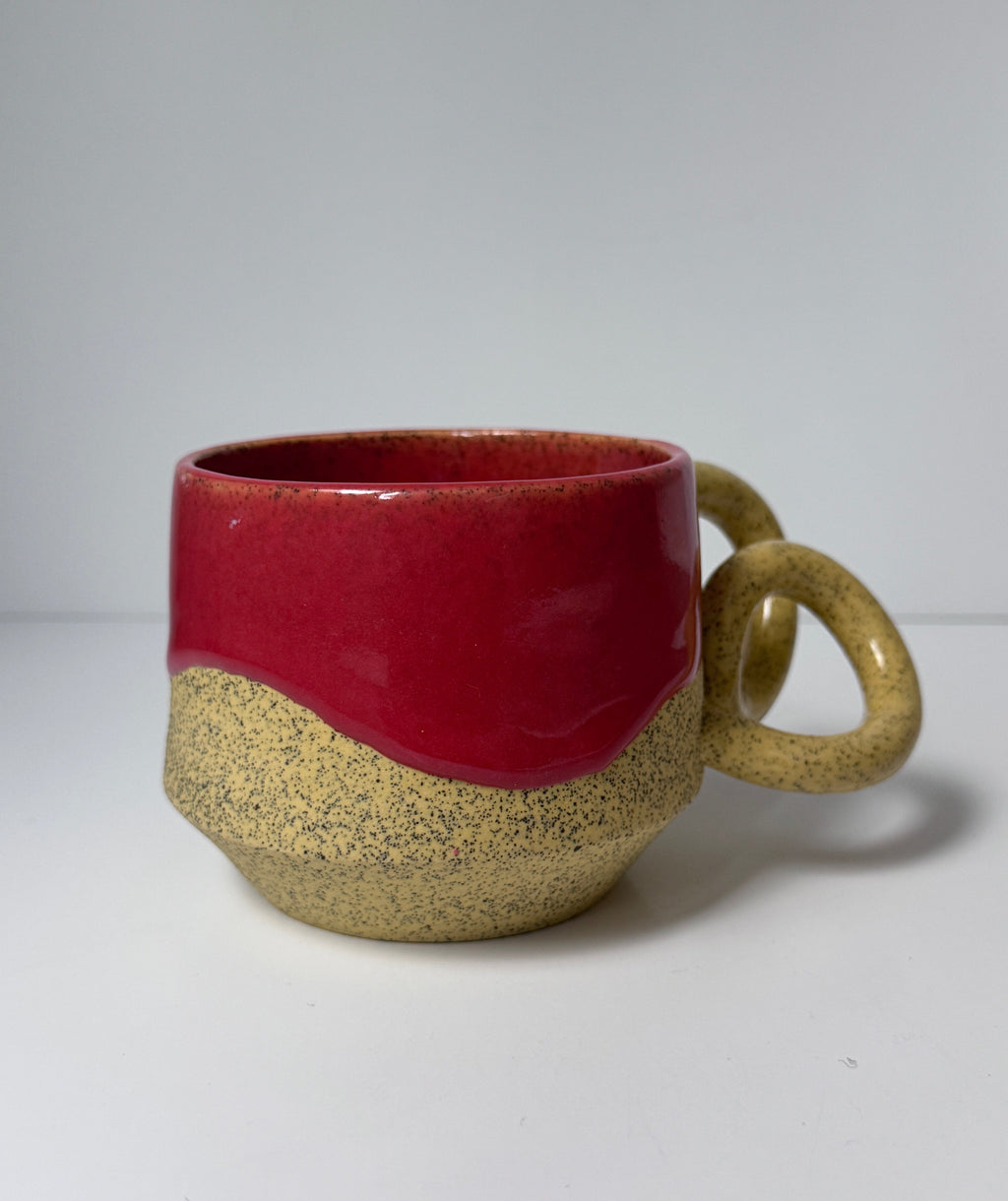 ‘Pink lemonade’ drippy glaze mug on yellow speckled porcelain