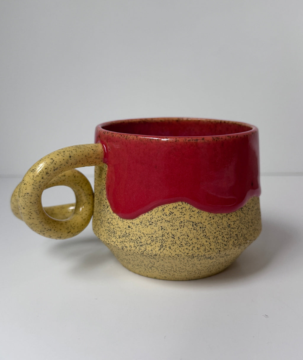 ‘Pink lemonade’ drippy glaze mug on yellow speckled porcelain